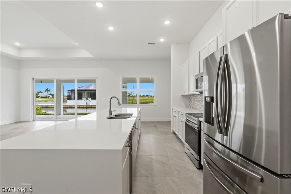 Image 12 of property listing at 1241 NW 33RD AVE, Cape Coral, FL 33993