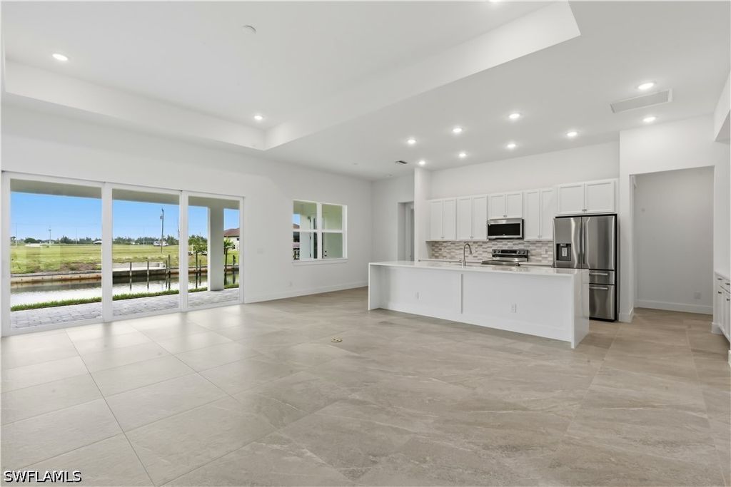 Image 13 of property listing at 1241 NW 33RD AVE, Cape Coral, FL 33993
