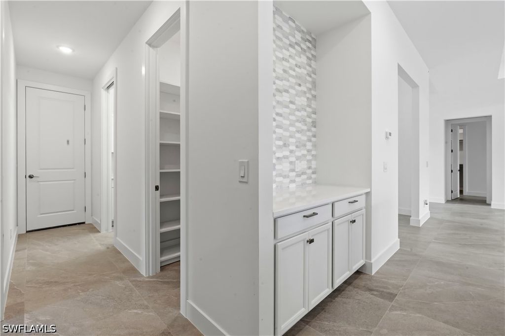 Image 4 of property listing at 1241 NW 33RD AVE, Cape Coral, FL 33993
