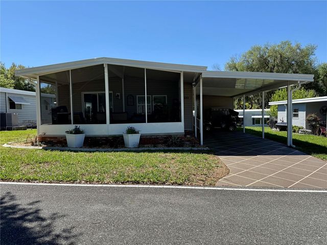 100 PAPAYA COVE, Leesburg, FL 34748