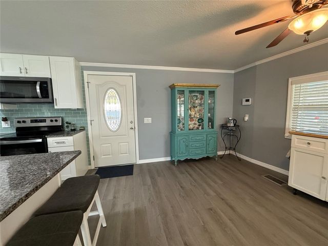 100 PAPAYA COVE, Leesburg, FL 34748