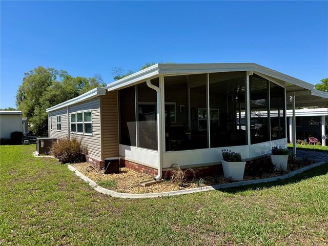 100 PAPAYA COVE, Leesburg, FL 34748