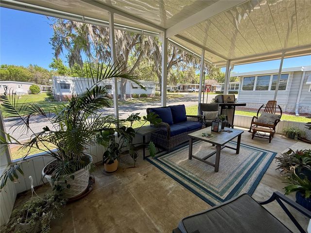 100 PAPAYA COVE, Leesburg, FL 34748