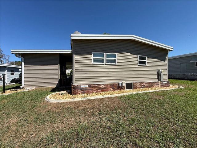 100 PAPAYA COVE, Leesburg, FL 34748