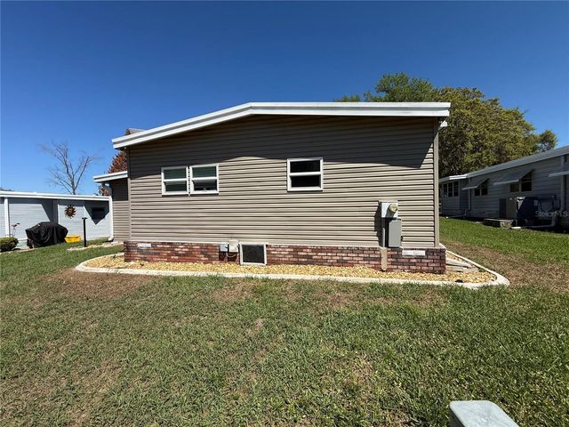 100 PAPAYA COVE, Leesburg, FL 34748