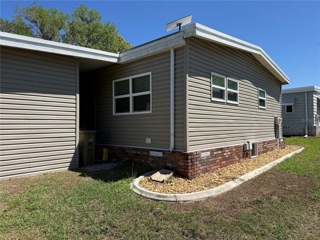 100 PAPAYA COVE, Leesburg, FL 34748