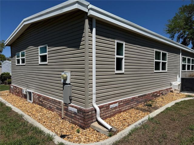 100 PAPAYA COVE, Leesburg, FL 34748