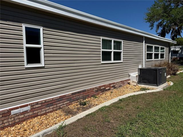 100 PAPAYA COVE, Leesburg, FL 34748