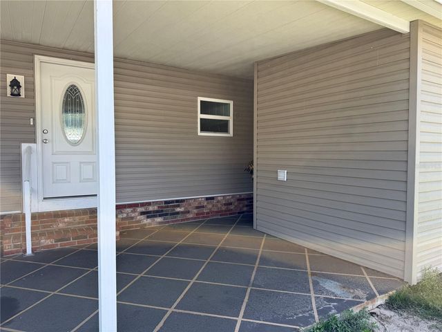 100 PAPAYA COVE, Leesburg, FL 34748