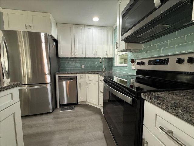 100 PAPAYA COVE, Leesburg, FL 34748