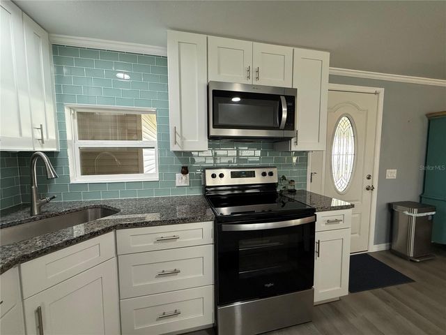 100 PAPAYA COVE, Leesburg, FL 34748