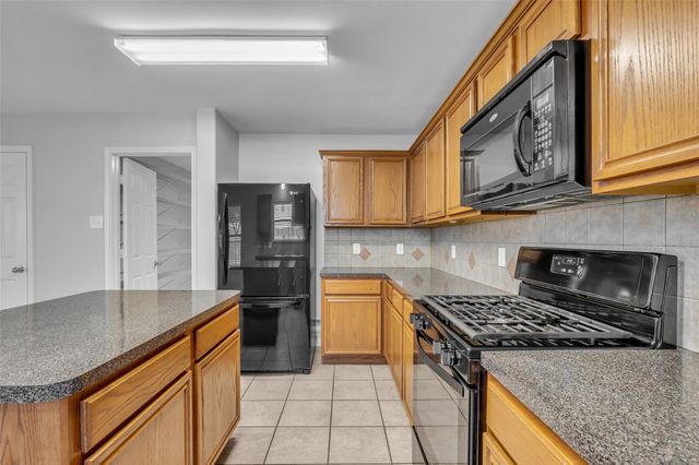 23610 Hidden Maple Drive, Spring, TX 77373