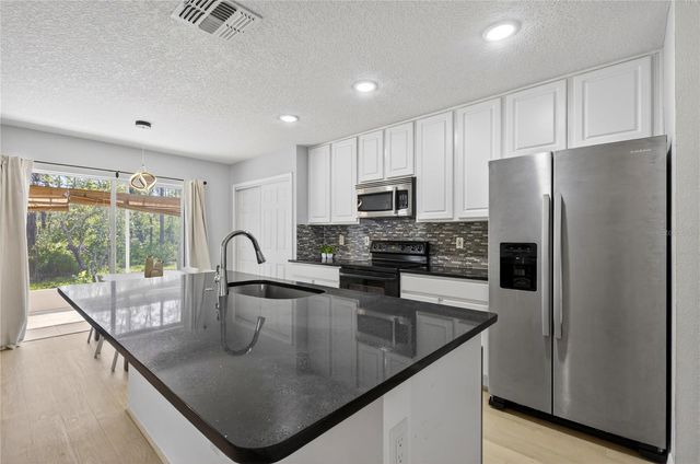 2006 STONE ABBEY BOULEVARD, Orlando, FL 32828