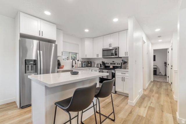 6816 S NORMANDY CIR, Midvale, UT 84047