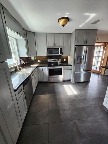 1003 PAPAYA DRIVE, Tampa, FL 33619