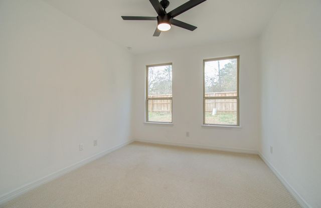 206 Cedar Creek Court, Pinehurst, TX 77362