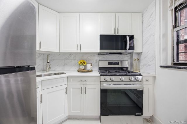 61-15 98th Street ST-F, Rego Park, NY 11374