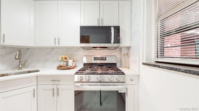 61-15 98th Street ST-F, Rego Park, NY 11374