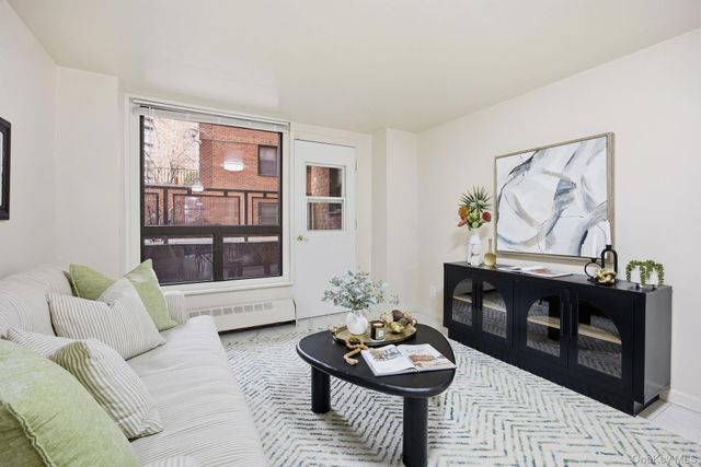 61-15 98th Street ST-F, Rego Park, NY 11374