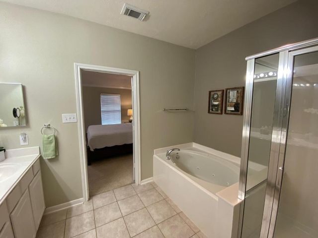 26 Baccara Place, Conroe, TX 77384