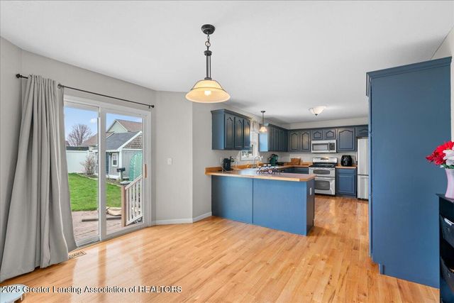 1851 Hollowbrook Drive, Holt, MI 48842