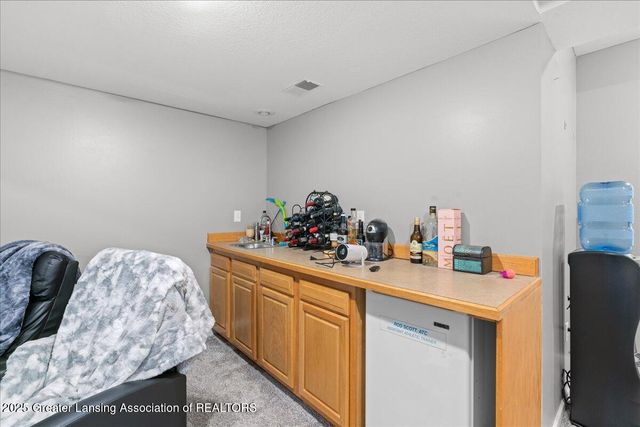 1851 Hollowbrook Drive, Holt, MI 48842