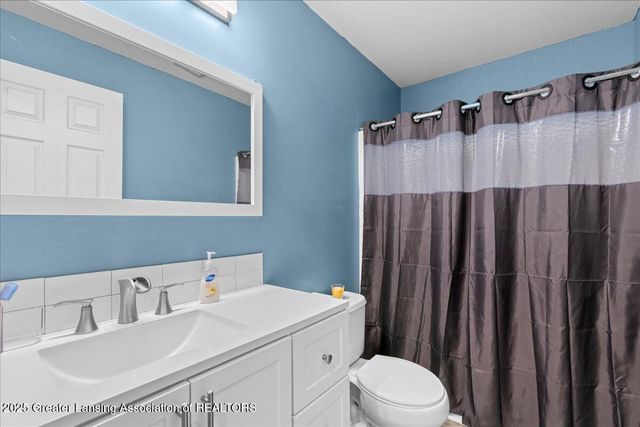 1851 Hollowbrook Drive, Holt, MI 48842