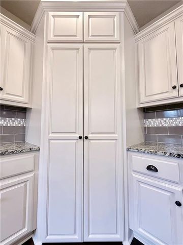 1900 Red Bud Court, Raymore, MO 64083