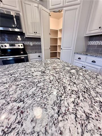 1900 Red Bud Court, Raymore, MO 64083