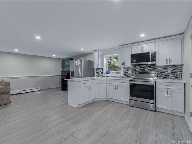 33 Winside Lane, Coram, NY 11727