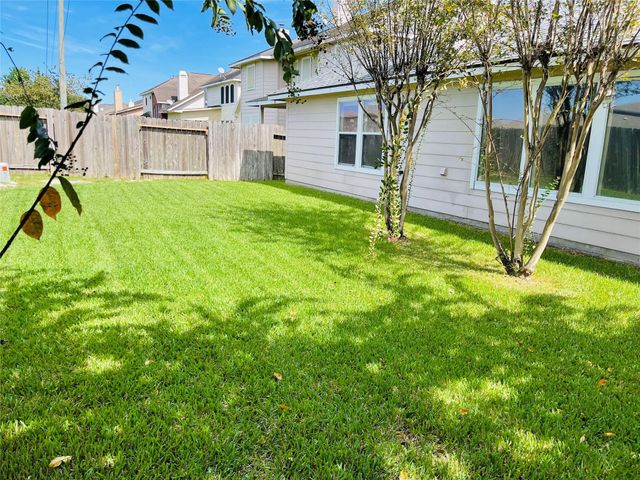 10723 Lake Riata Lane, Cypress, TX 77433