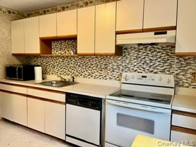 46 Blue Point Road E, Holtsville, NY 11742