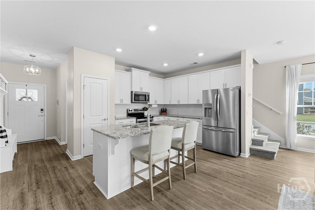 Image 5 of property listing at 138 Ainsdale Drive, Richmond Hill, GA 31324