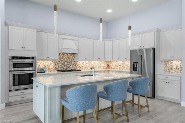 9512 Greyhawk TRL, Naples, FL 34120