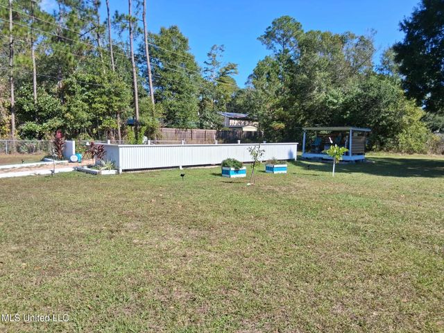 9035 Pine Drive, Bay Saint Louis, MS 39520