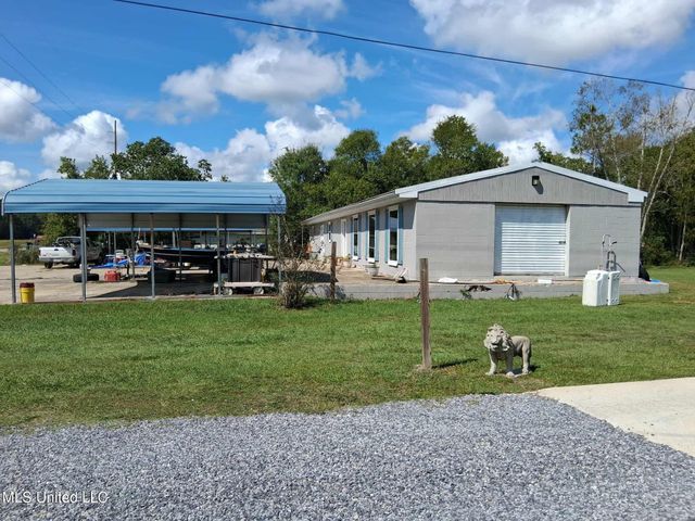 9035 Pine Drive, Bay Saint Louis, MS 39520