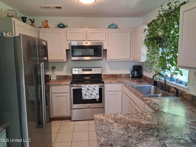 9035 Pine Drive, Bay Saint Louis, MS 39520