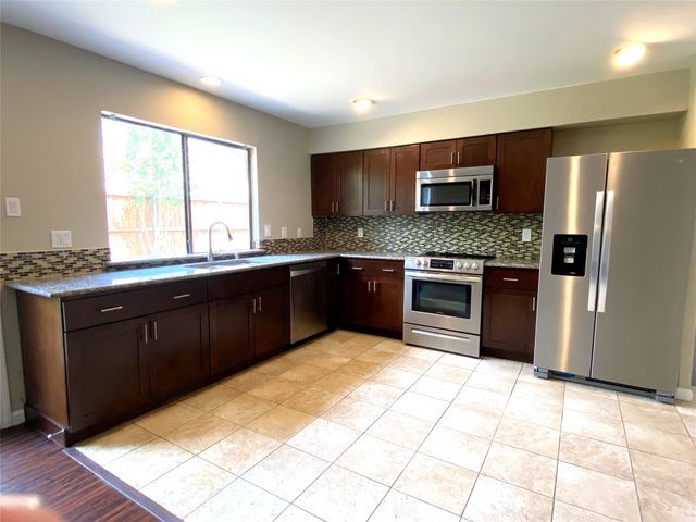 2704 Winding Creek Drive, Carrollton, TX 75007