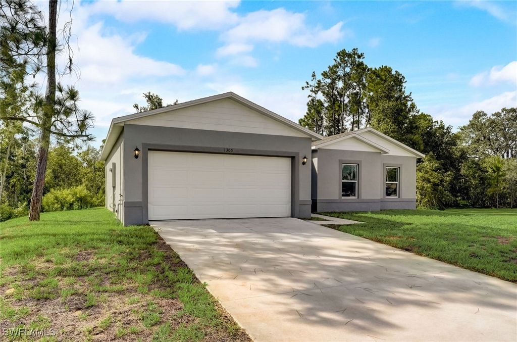166 Fremont AVE S, Lehigh Acres, FL 33974