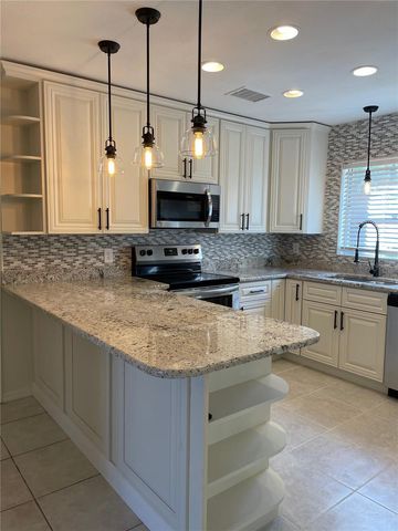 1424 CHESTERFIELD DRIVE, Dunedin, FL 34698