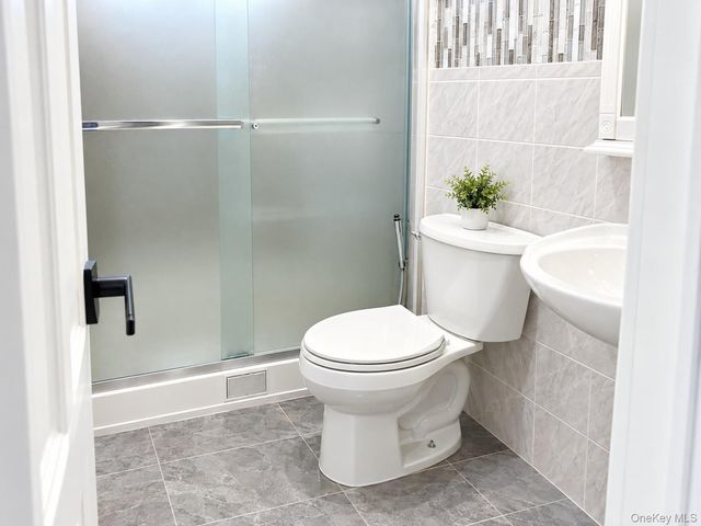 9513 107th Street, Ozone Park, NY 11416