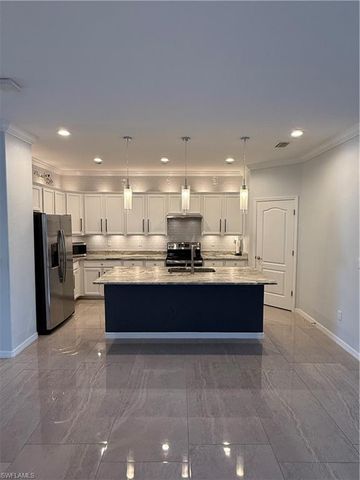 9317 Woodhurst DR, Naples, FL 34120