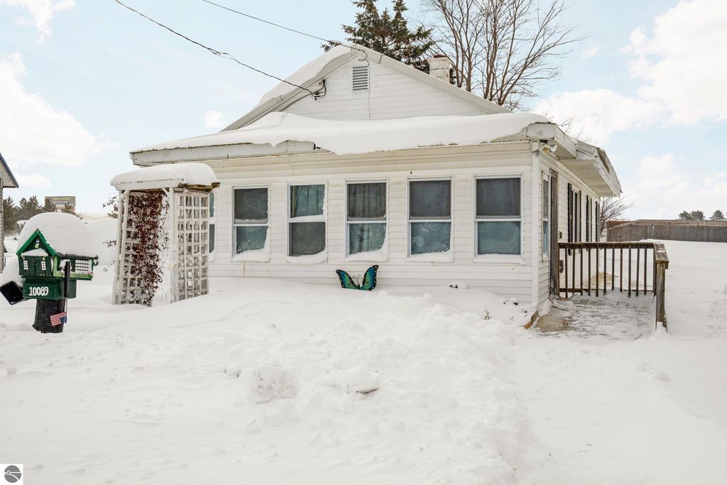 Image 1 of property listing at 10089 Otis Drive, Mancelona, MI 49659