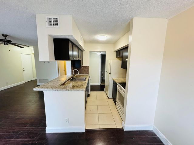 5686 Rock Island Road 115, Tamarac, FL 33319