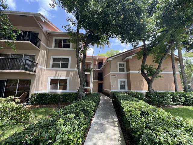 8955 Wiles Road 303, Coral Springs, FL 33067