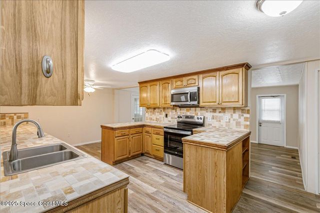 1788 Big Cypress Street NE, Palm Bay, FL 32905