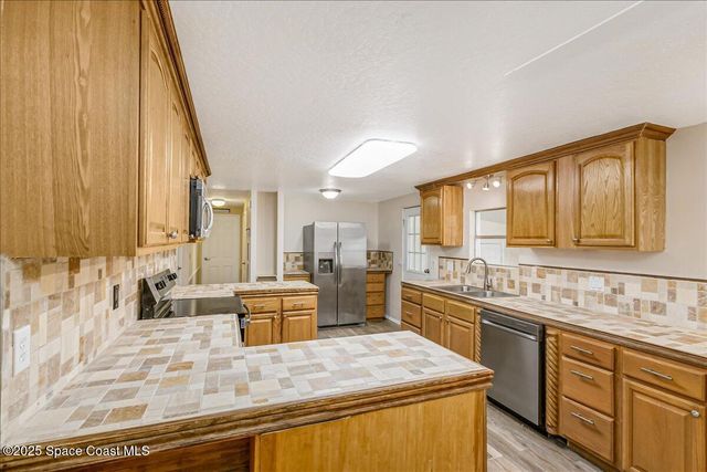 1788 Big Cypress Street NE, Palm Bay, FL 32905