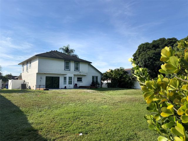 128 N Royal Pine Cir N, Royal Palm Beach, FL 33411