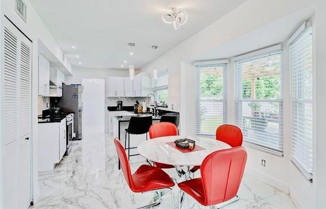 128 N Royal Pine Cir N, Royal Palm Beach, FL 33411