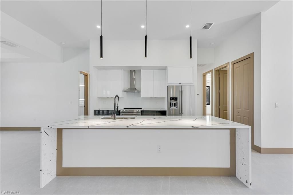 Image 8 of property listing at 1925 NW 34th PL, Cape Coral, FL 33993